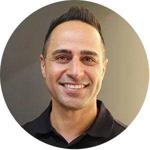 Professional portrait of Dr. Khaef, an experienced and compassionate dentist at Harmony Dentalcare.