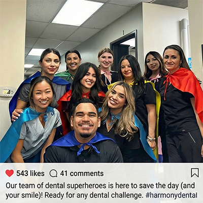 The friendly Harmony Dentalcare team dressed up in creative costumes, celebrating together at our office Halloween party